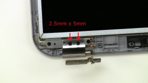 Remove the left hinge cover screws (2 x M2.5 x 5mm).