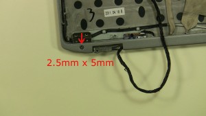 Remove the left hinge screw (1 x M2.5 x 5mm).