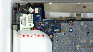 Remove the modem card screw (1 x M2 x 3mm).