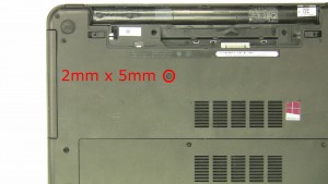 Remove the 1 - M2.5 x 5mm optical drive screw.