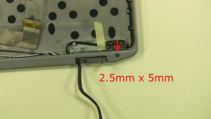 Remove the right hinge screw (1 x M2.5 x 5mm).