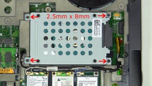 Remove the hard drive screws and lift the hard drive out of the laptop (4 x M2.5 x 8mm).