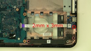 Remove the 1 - M2 x 3mm USB circuit board screw.