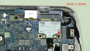 Remove the WLAN card screw (1 x M2 x 3mm).