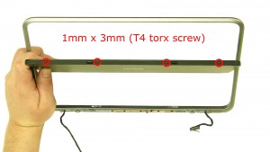 Remove the screws on the top and bottom of the screen (8 x 1x3mm T4 torx).