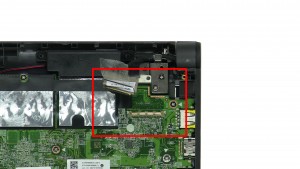 Pull back adhesive and latch to remove LCD Cable.