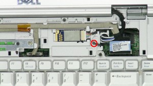 Loosen the LCD cable screw.