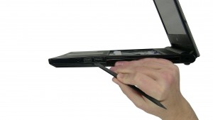 Unsnap & separate the Bottom Base from the laptop.