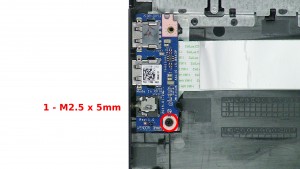 Remove the 1 - M2.5 x 5mm screw.