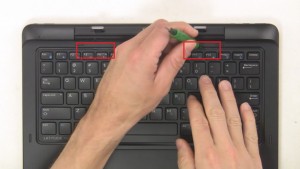 Use flat head screwdriver to pry open and remove Keyboard Bezel.