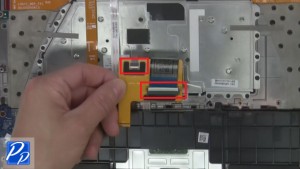 Turn over ribbon and unplug keyboard connectors.