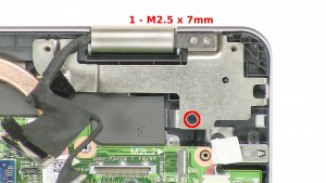 Remove the 1 - M2.5 x 7mm right hinge screw.