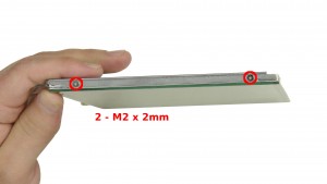 Remove the 4 - M2 x 2mm left & right hinge rail screws.