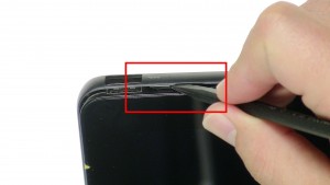 Using a scribe, carefully separate the base from the screen.