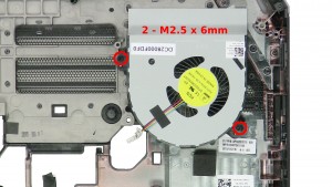 Remove the 2 - M2.5 x 6mm right fan screws.