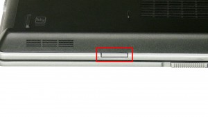 Press the SD Card in to eject it from the laptop.