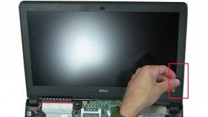 Use fingers to pry apart and separate the LCD Bezel.