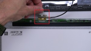 Disconnect cable and remove LCD Screen.