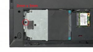 Unscrew and slide out Hard Drive (1 x 