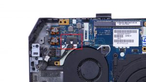 Turn over motherboard and disconnect DC jack cable.