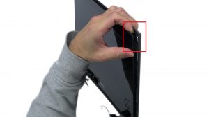 Use fingers to pry apart and separate LCD back from display panel.