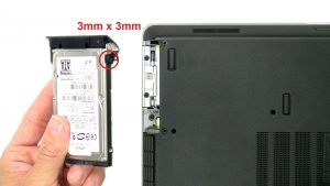 Unscrew and remove hard drive caddy (1 x M3 x 3mm).