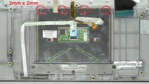 Unscrew and remove touchpad (4 x M2 x 2mm).