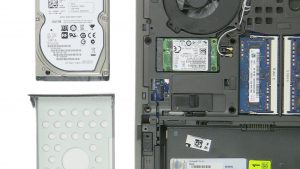 Press out Hard Drive from underside of caddy.