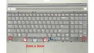 Unscrew and turn over keyboard (4 x M2 x 3mm).