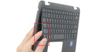 Press through palmrest to release and remove Keyboard.