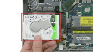 Unscrew and remove bracket and Hard Drive (2 x 