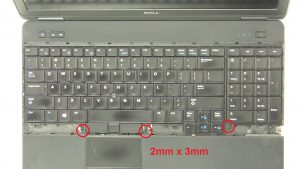 Unscrew and turn over keyboard (3 x M2 x 3mm).