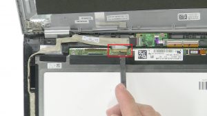 Disconnect and remove Display Cable.