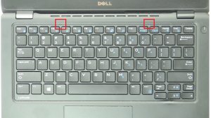 Use fingers to pry apart and remove Keyboard Bezel.