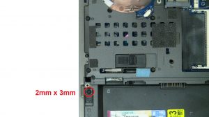 Unscrew and slide over locking mechanism to release hard drive (1 x M2 x 3mm).