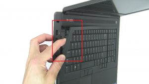 Use fingers to gently unsnap and remove Keyboard Bezel.