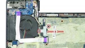 Unscrew bracket and disconnect display cable.