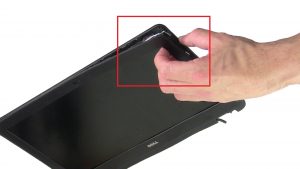 Use fingers to pry apart and remove Display Bezel.