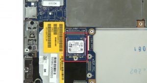 Unscrew bracket and remove Solid State Drive (1 x 