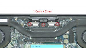 Unscrew and disconnect display cable.