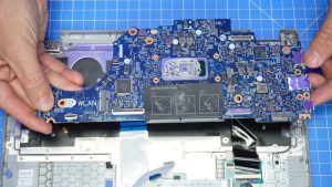 Unscrew and remove the Motherboard (2 x 