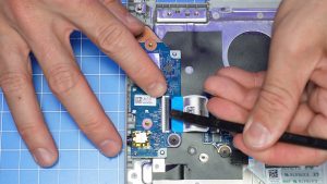 Unscrew and remove USB/I/O Circuit Board (2 x 