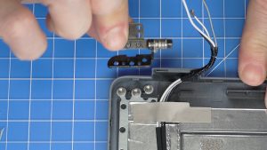 Unscrew and remove the LCD Screen Hinges (4 x 