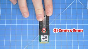 Unscrew and slide out the M.2 2230 SSD assembly (3 x M2 x 3mm).