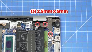 Unscrew and lift the right LCD hinge (3 x M2.5 x 5mm).