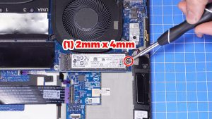 Unscrew and slide out the M.2 NVMe SSD (1 x 