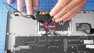 Disconnect the touchpad cables.