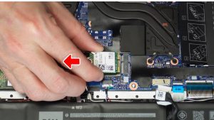 Unscrew and remove the bracket from the WiFi Card (1 x 