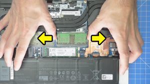 Separate clips outwardly to release the RAM/Memory.