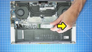 Unscrew and remove the SSD bracket (2 x M2 x 2mm).